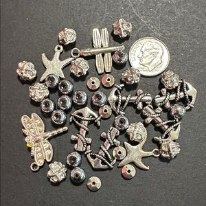 12.  Silver Tone Metal Loose Beads